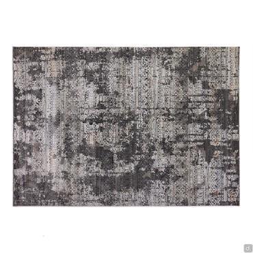 Tapis à motifs vintage dans les tons gris.
