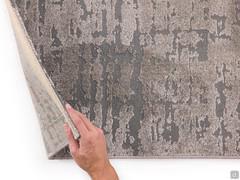 Détail de l'épaisseur du tapis Cortina