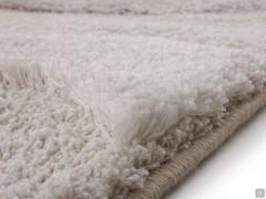 Détail de la pile longue avec double épaisseur et bord affleurant