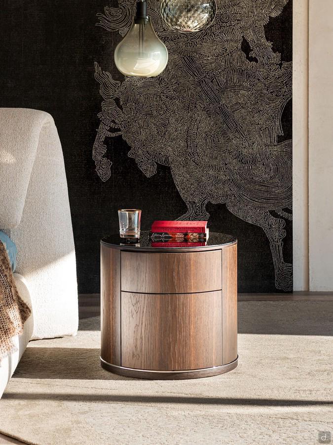 Comodino rotondo Lido di Cattelan in legno impiallacciato noce o rovere bruciato, completo di due cassetti con apertura mediante push-pull