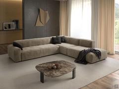 Divano Lennox qui proposto in una composizione ad angolo da 339 x 317 cm formata da terminale da 229 p.110 cm, elemento angolare da 173 cm e terminale panoramico da 140 p.110 cm