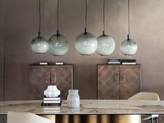 Lampada tonda sospesa Paris di Cattelan in una composizione a cinque elementi che racchiude entrambe le dimensioni disponibili