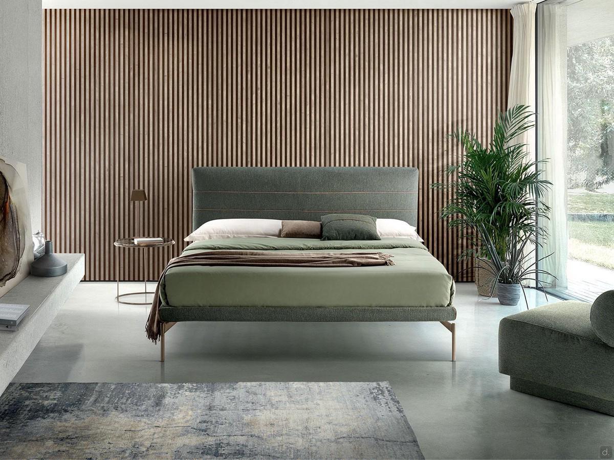 Letto tessile sartoriale Morgan con rivestimento in tessuto verdone e dettagli a contrasto