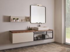 Atalantic N115 - top in legno massello rovere bollito con spessore cm 4, con lavabo in minera-kolor laccato opaco K2 Thala-Ru. Mensola con schienale e base con cestone coordinate al lavabo.