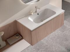 La consolle lavabo in ceramica lucida bianca è dotata di ampia vasca interna, cm 57