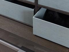 Particolare dei contenitori rivestiti in tessuto screziato azzurro grigio