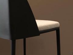 Dettaglio dello schienale perfettamente raccordato alla struttura e alla gambe rivestite in cuoio