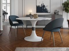 Sofisticato ambiente living impreziosito dal tavolo Calice in vetro ceramica