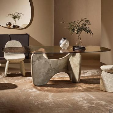 Tavolo a botte in marmo con base scultorea Masai