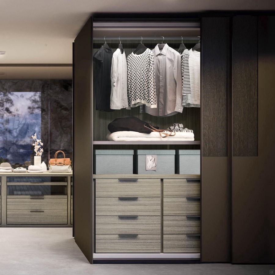 armoire de séparation entre la chambre principale et la pièce dressing avec îlot central