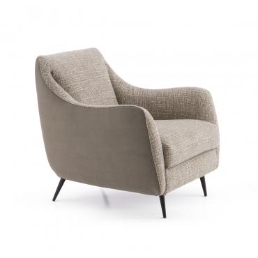 Fauteuil confortable Jolie avec accoudoirs, pieds hauts en métal et revêtement en tissu, similicuir, velours et cuir.