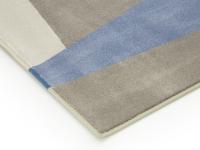 Particolare del tappeto Alicante sui toni del grigio con accento azzurro e bordo tono su tono