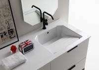 détail du lavabo en mineralguss avec planche à laver dans le même matériel disponible en option