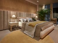 Élégant lit Lounge avec tête de lit basse équipé de compartiment ouvert en finition métallisée et spots assortis