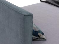 Détail de la tête de lit de forme carrée avec couture brodée point de feston