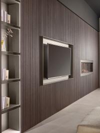 Composition murale TV Lounge dans la finition exclusive en bois massif TAMMAS Wave, uniquement disponible sur demande dans le cadre d'un projet.