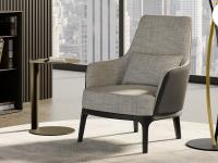 Élégant fauteuil bi-matière et/ou bicolore Michela, proposé avec dossier en cuir qui contraste avec l'assise revêtue de tissu