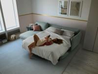 Canapé-lit confortable avec méridienne Dover avec accoudoirs ajustables