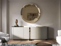 Miroir circulaire design Cosmos de Cattelan associé au buffet moderne Dynasty avec plateau en verre bronzé