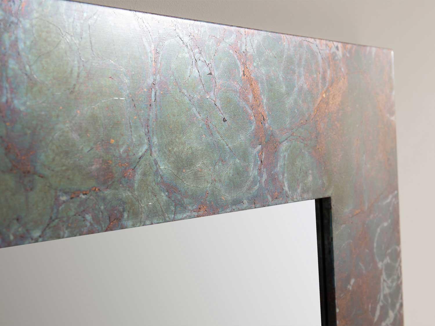 Cornice in legno lavorato argento puro ossidato