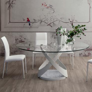 Tavolo rotondo di design con piano in vetro e struttura con base in marmo Capri