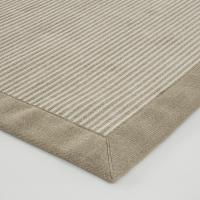 Tappeto Cipro color lino con bordo applicato in lino naturale