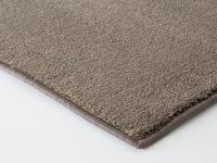 Particolare del tappeto Bruges pernice con bordo a filo in nylon in tinta