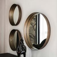 Specchio rotondo Wish di Cattelan in metallo verniciato brushed bronze