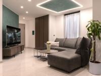 Progetto del soggiorno con divano, tavolini e porta TV - Foto Cliente
