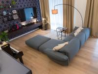 Zona relax dell'appartamento con grande divano