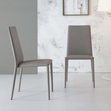 Eral chair covered in faux leather or leather with matt lacquered white metal structure 