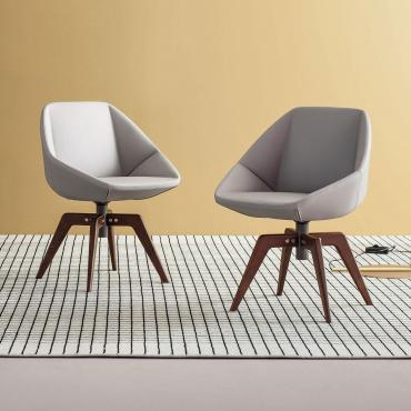 Stone is a modern swivel upholstered chair by Bonaldo