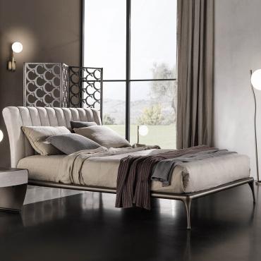 Iseo bed with vertical quilted headboard by Cantori