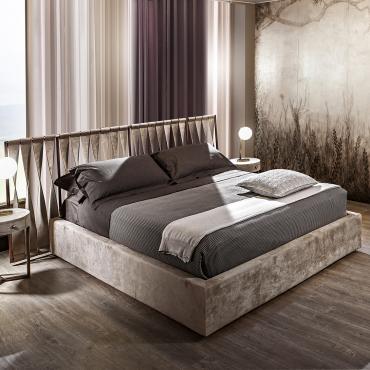 Twist by Cantori upholstered bed with twisted leather straps