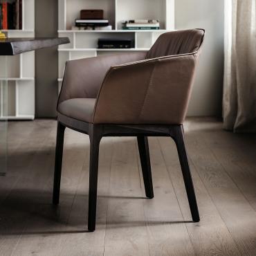 Musa tub dining chair by Cattelan fitted with high armrests