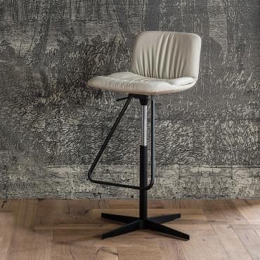 Axel is a stool by Cattelan with a central spoke or square base