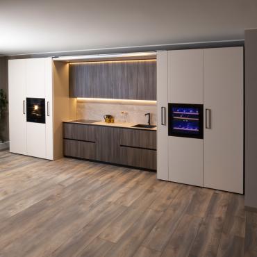 Kitchen with big cooking area and integrated snack bar counter