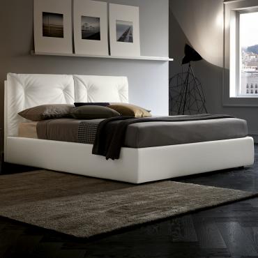 Tucano bed with reclining quilted headboard