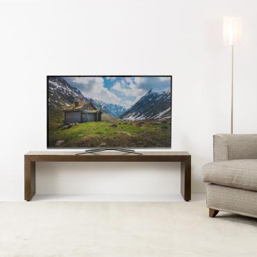 Alma wooden minimalist TV stand with a modern bridge-like shape