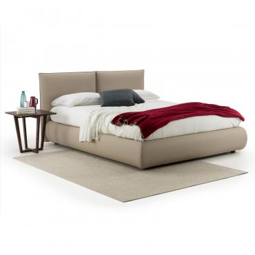Becket has a soft upholstered bed frame and a cushioned headboard