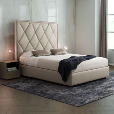 Olivier double bed with tall quilted headboard