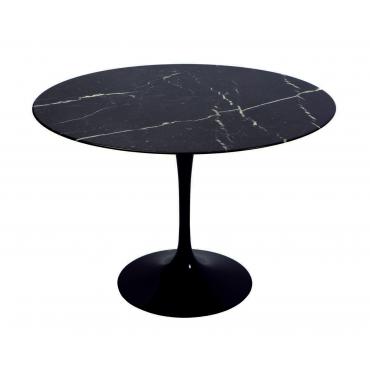 Saarinen is a round elliptical table originally projected and designed by Eero Saarinen