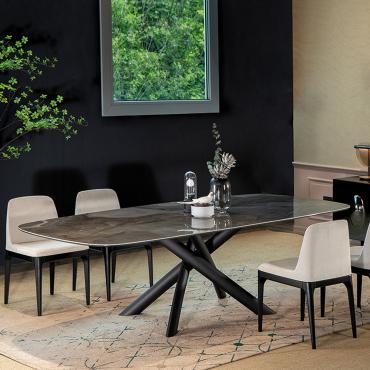 Style extendable dining table with central base - base in bronze lacquered metal and top in Gres porcelain