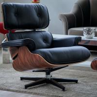 The Eames armchair, a replica inspired by Charles Eames’ design, is available in wood, leather or fabric