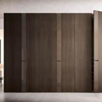 Slice is a hinged wardrobe with decorative band