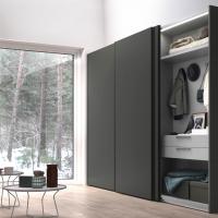 Wide sliding wardrobe with Midley door and matt lacquered recess grip in black