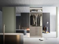 Reflexion is a fitted wardrobe with mirror doors. Its modular structure with sliding doors is perfect to make small rooms look bigger