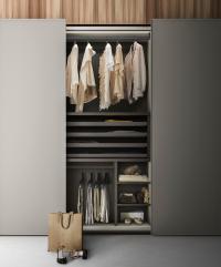 Player wardrobe interior fittings - chest of drawers with 4 pull out trays and a dividing element with 2 shelves
