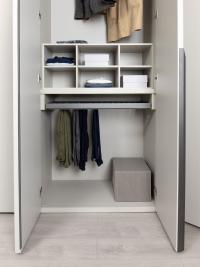 Interior fittings for Player hinged wardrobe: shirt organiser and pull-out trouser rack