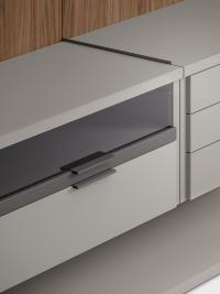 Suspended drawer unit with drawers in clear grey glass and wood